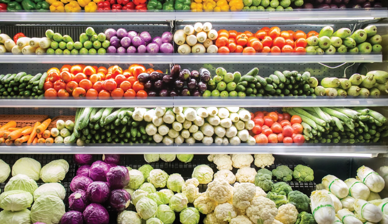 Vegetables displayed on a supermarket shelf